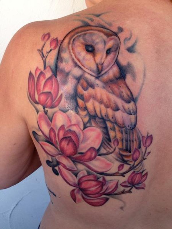 Stippling style colored scapular tattoo of big owl with flowers