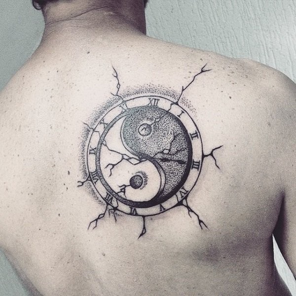 Stippling style Yin Yang symbol tattoo on back stylized with clock