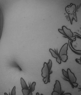 Stomach tattoo, many gray butterflies, teeth