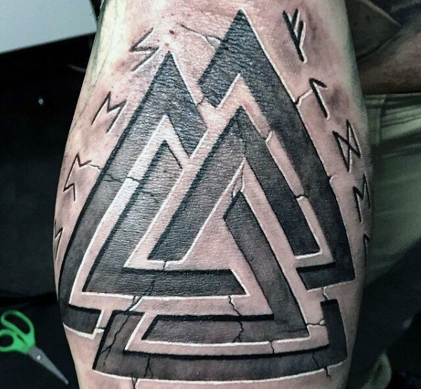 Stone like colored ancient symbols tattoo with lettering
