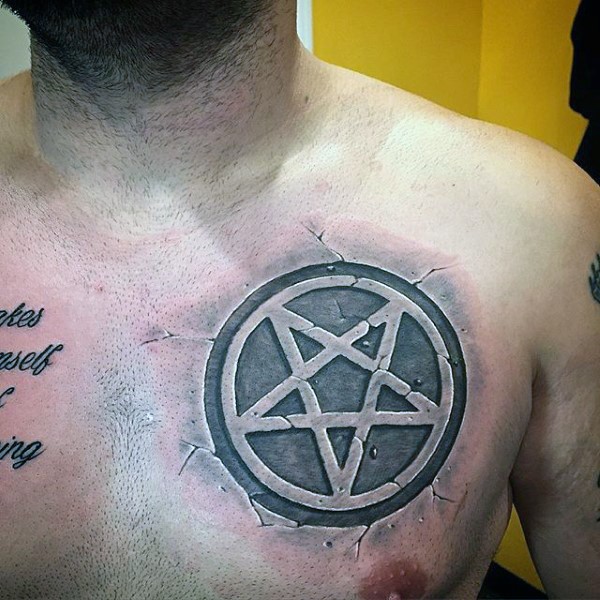 Stone like colored chest tattoo of creepy looking demonic star