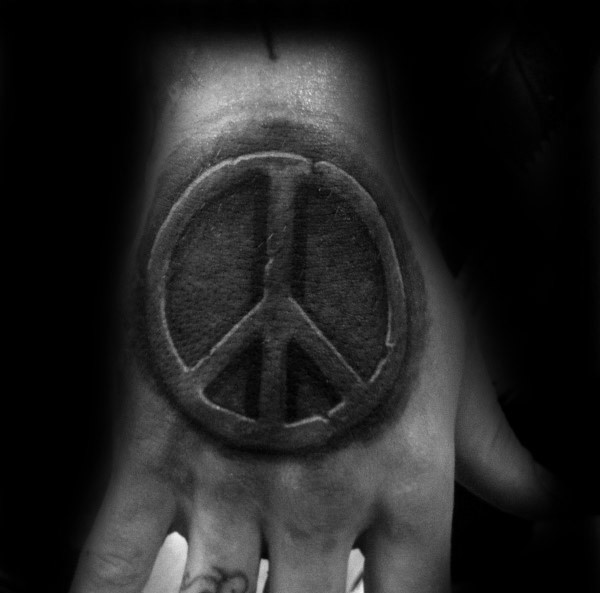 Stone work style black ink hand tattoo of pacific symbol