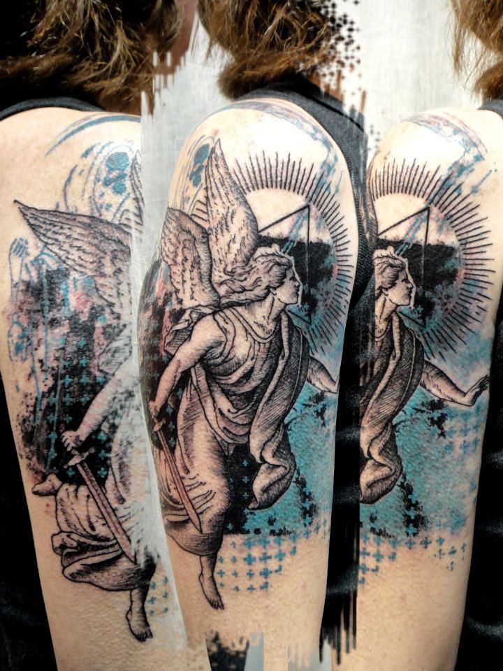 Stonework style colored shoulder tattoo of angel statue