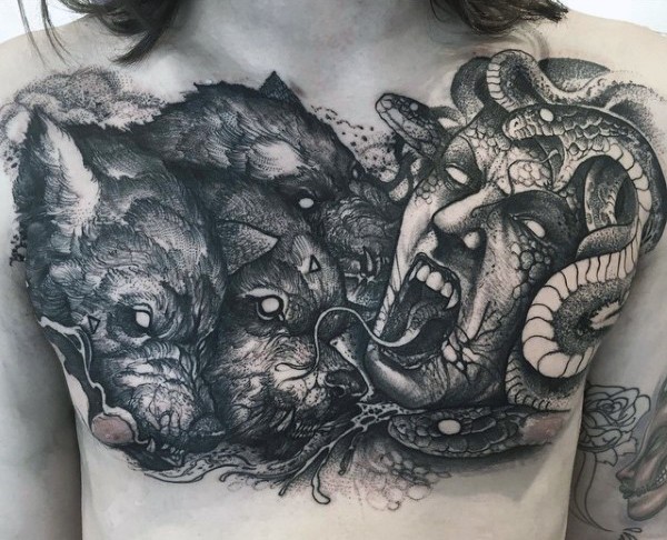 Stonework style cool looking chest tattoo of Cerberus with Medusa head