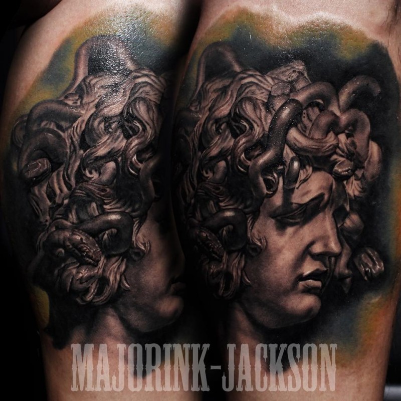 Stonework style detailed arm tattoo of sad Medusa head