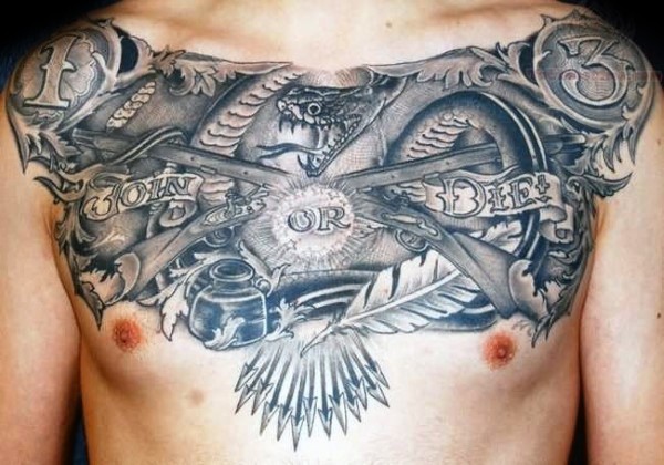 Stonework style detailed chest tattoo of join or die lettering with crossed rifles and feather
