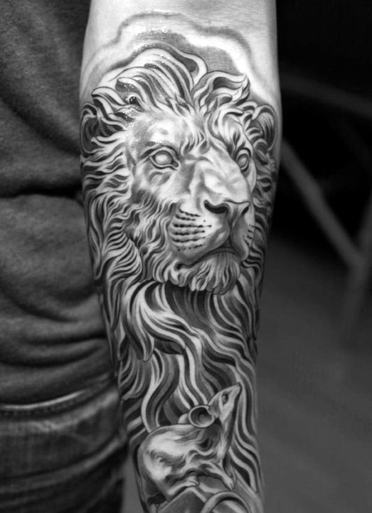 Stonework style detailed forearm tattoo of lion statue
