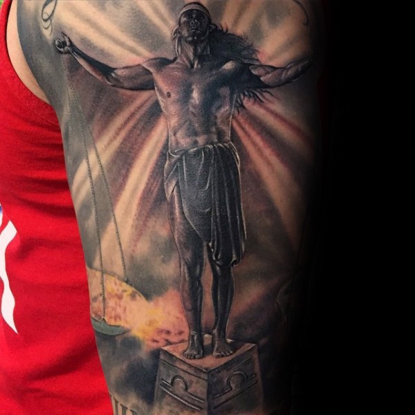 Stonework style detailed shoulder tattoo of coll statue
