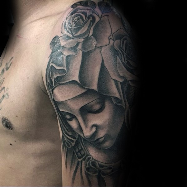 Stonework style detailed woman with flowers tattoo on shoulder