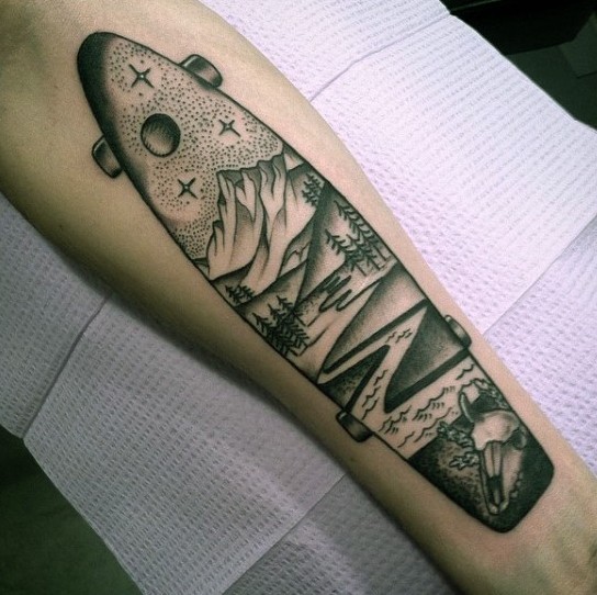 Stonework style interesting looking skateboard tattoo on forearm stylized with night countryside
