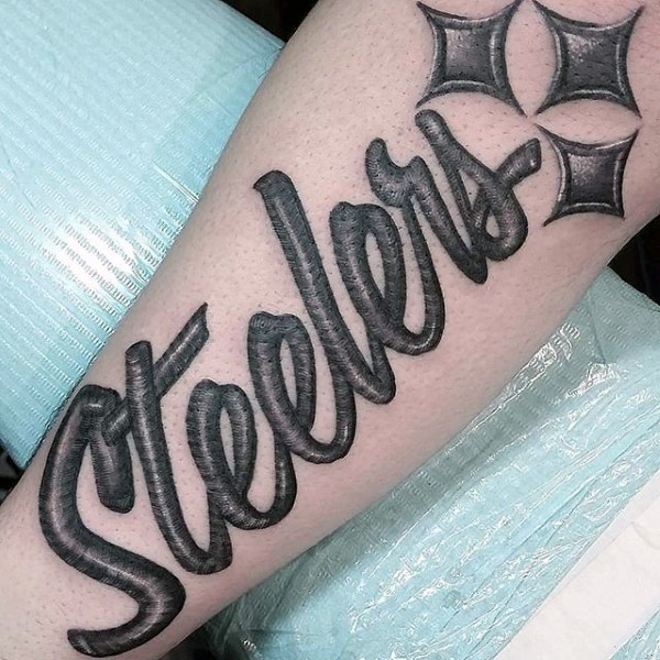 Stonework style interesting looking tattoo of lettering with stars