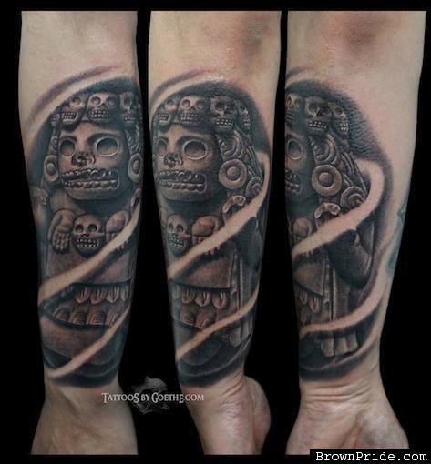 Stonework style medium size forearm tattoo of ancient Mayan statue