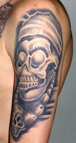Stonework style shoulder tattoo of ancient statue
