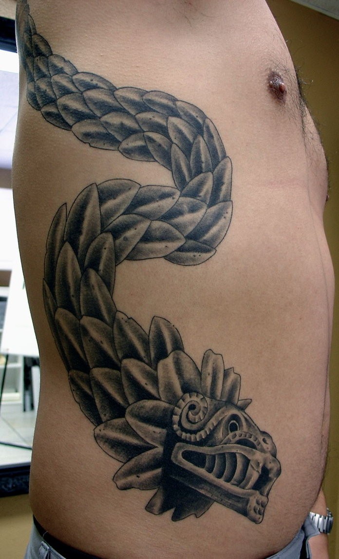 Stonework style side tattoo of fantasy dragon
