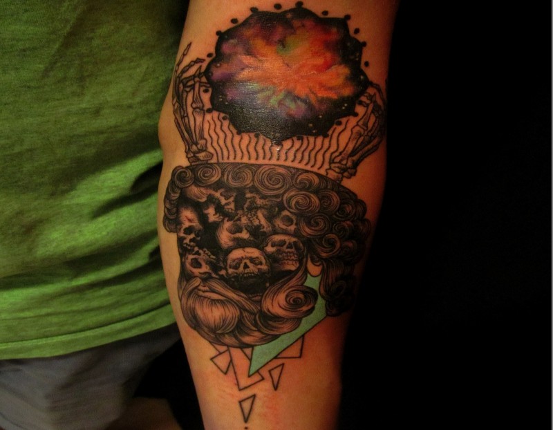 Strange looking colored arm tattoo of surrealistic picture