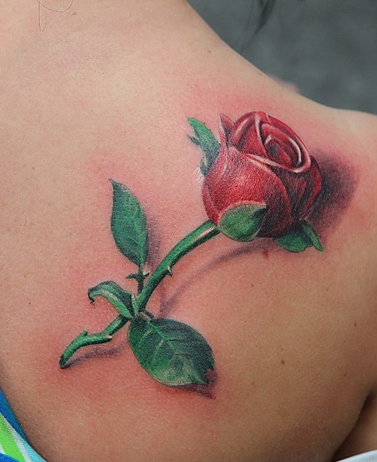 Stunning 3D realistic colored little rose tattoo on shoulder