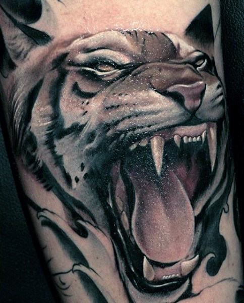 Stunning 3D style colored forearm tattoo of tiger head