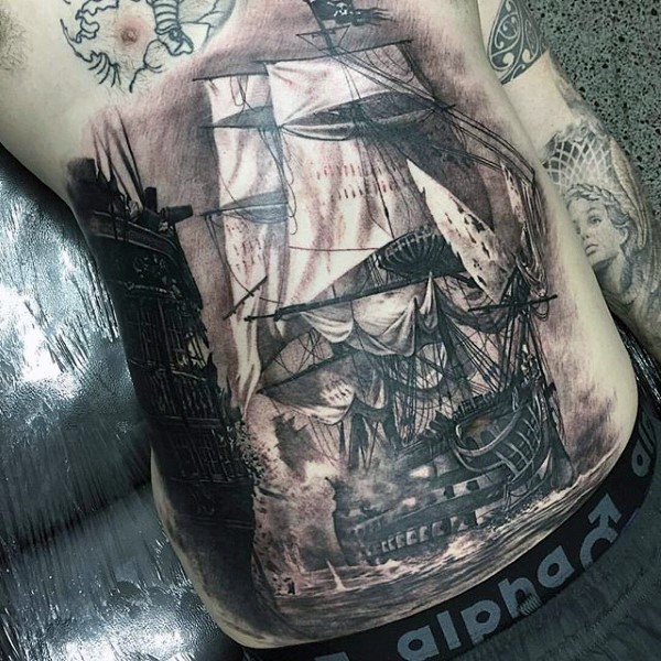 Stunning black and white belly tattoo of antic sailing ships battle