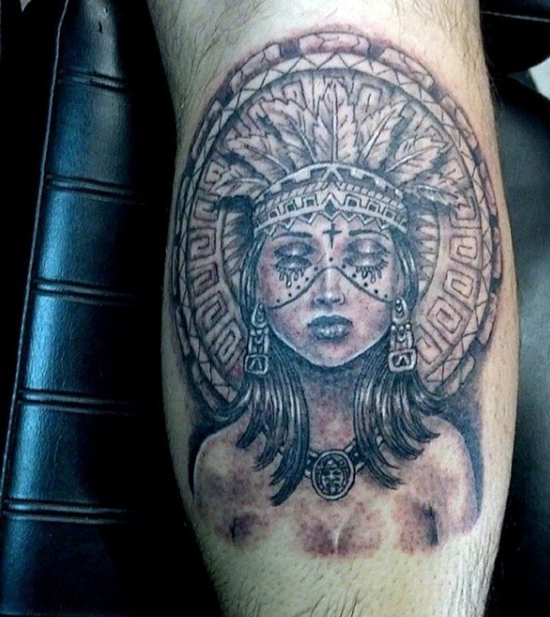 Stunning black and white leg tattoo of mystical tribal woman