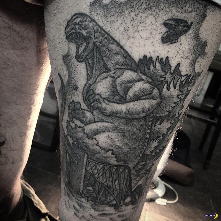 Stunning black ink engraving style large thigh tattoo of evil Godzilla