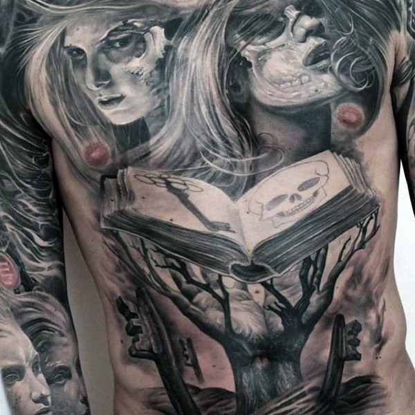 Stunning black ink mystical whole chest tattoo of demonic women portraits and magic book