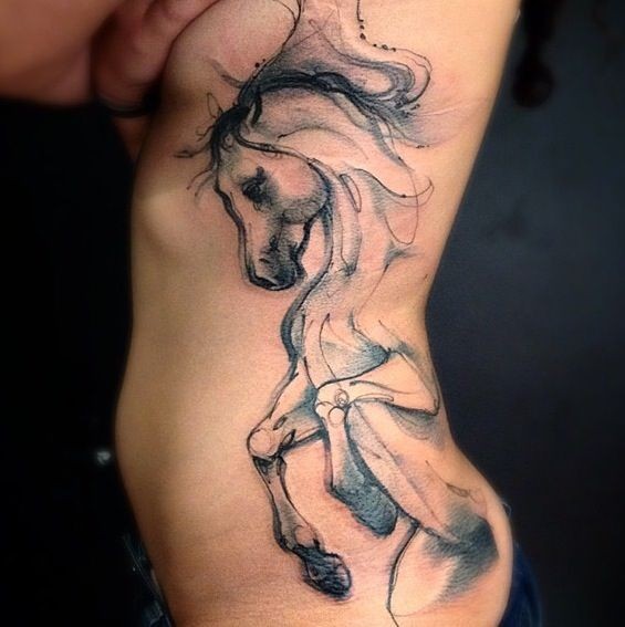 Stunning black ink side tattoo of horse