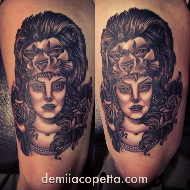 Stunning black ink thigh tattoo of woman with lion skin helmet