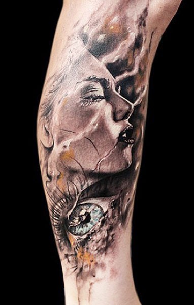 Stunning colored leg tattoo of woman face with eye
