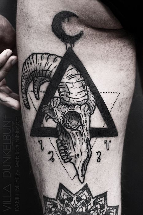 Stunning combined mystical black and white cult tattoo with triangle and animal skull on leg