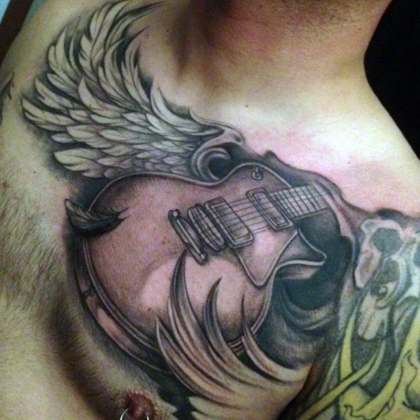 Stunning designed black and white guitar with wings tattoo on chest