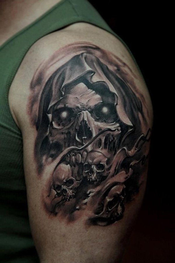 Stunning looking black and gray style shoulder tattoo of demonic skeleton