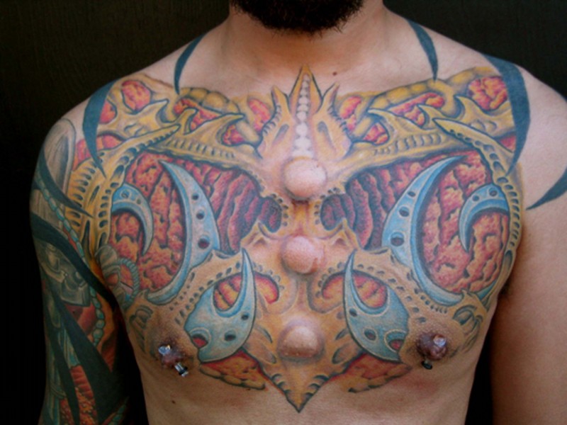 Stunning looking colored chest tattoo of fantasy like armor