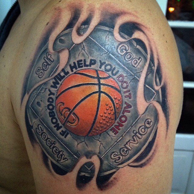 Stunning multicolored shoulder tattoo of basketball emblem with lettering