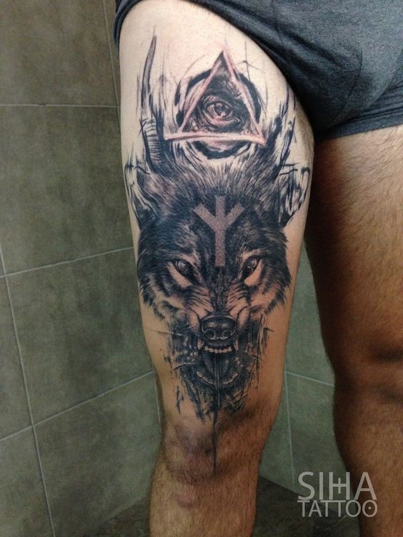 Stunning mystical thigh tattoo of devils wolf with triangle