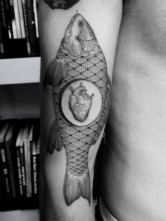 Stunning painted big black and white detailed fish with heart tattoo on arm