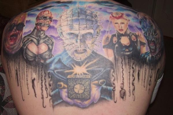 Stunning painted massive colored horror movie heroes tattoo on upper back