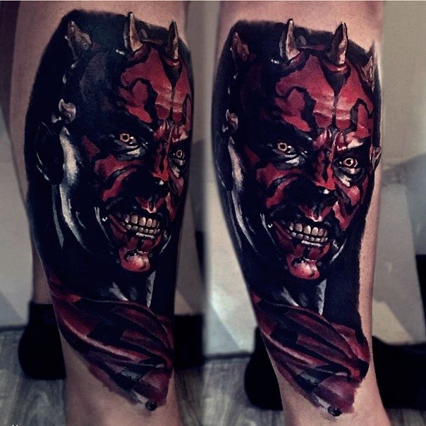 Stunning realistic looking very detailed smiling Darth Maul tattoo on leg