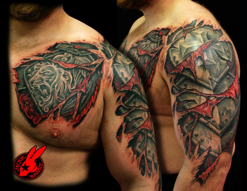 Stunning under skin style colored shoulder and chest tattoo of medieval armor with lion emblem