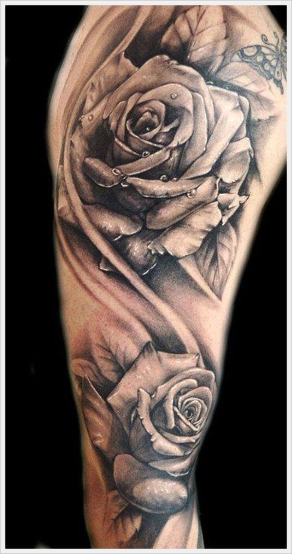 Stunning very detailed black and white roses with water drops tattoo on shoulder