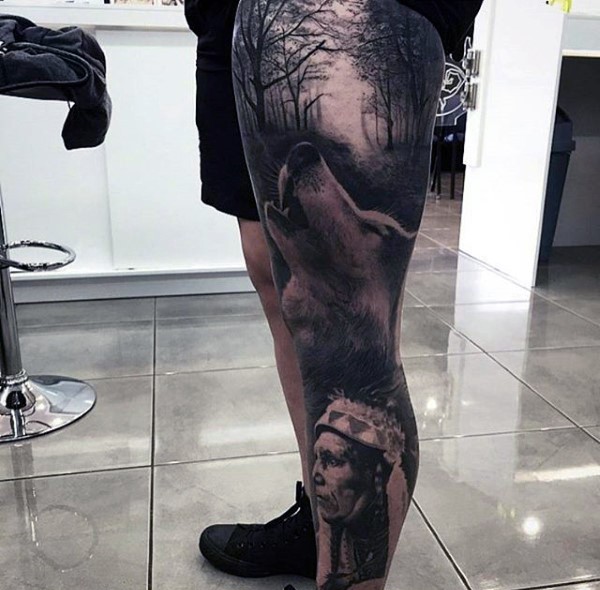 Stunning very detailed black ink Old Indian chief with wolf tattoo on whole leg stylized with mystical forest