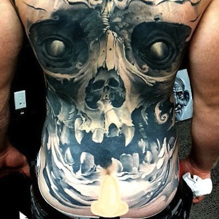 Stunning very detailed colored on whole back tattoo of mystical skull