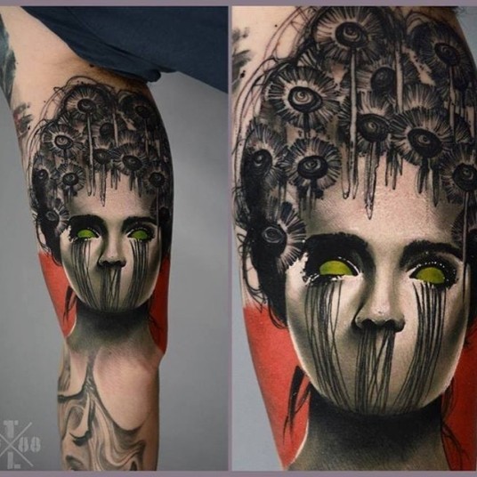 Stunning very detailed mystical on biceps tattoo of demonic woman portrait