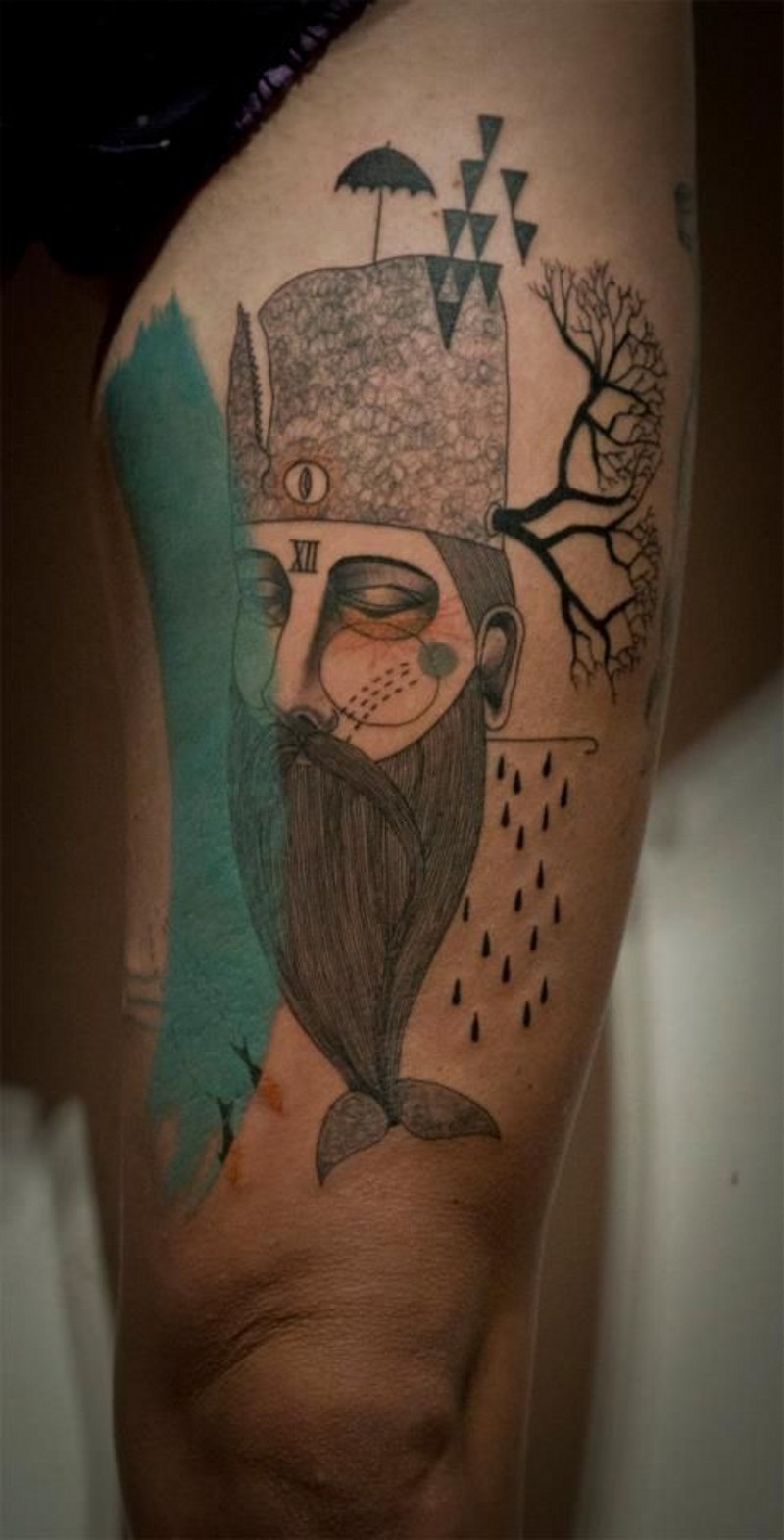 Stupid designed and colored unusual portrait tattoo on thigh