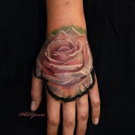 Super lifelike 3D realistic pale pink tea rose flower tattoo on hand in realism style