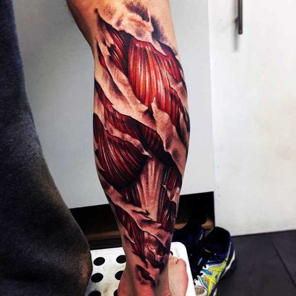 Super realistic naturally colored leg muscles tattoo in torn ripped skin