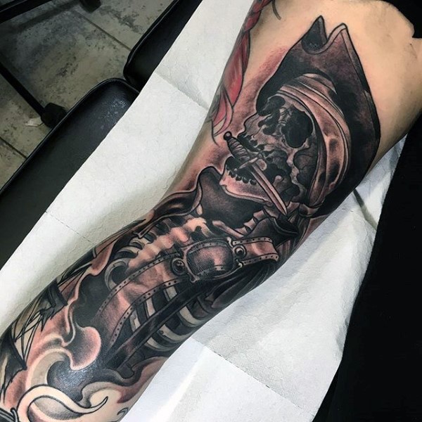 Superior black and gray style leg tattoo of old pirates skeleton with knife