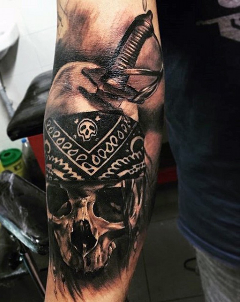 Superior black and white dead skeleton with sword tattoo on arm