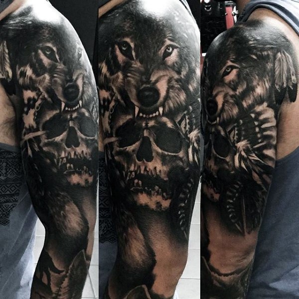 Superior detailed big black ink old Indian skull tattoo on sleeve with wolf helmet
