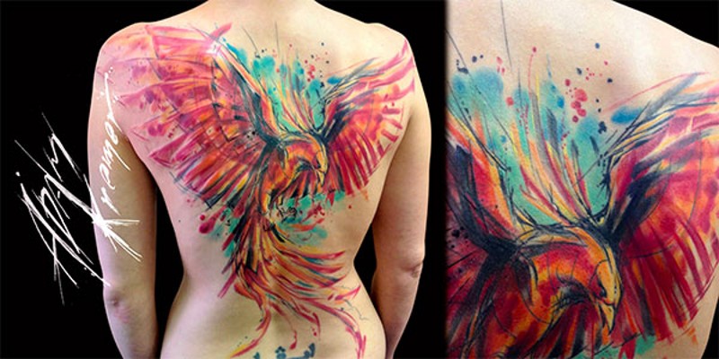 Superior painted abstract big colored phoenix tattoo on whole back