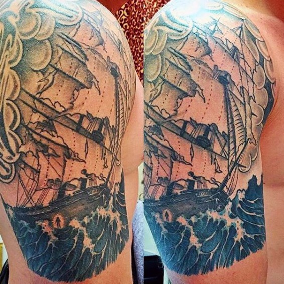 Superior painted black and white big old ship in waves tattoo on arm